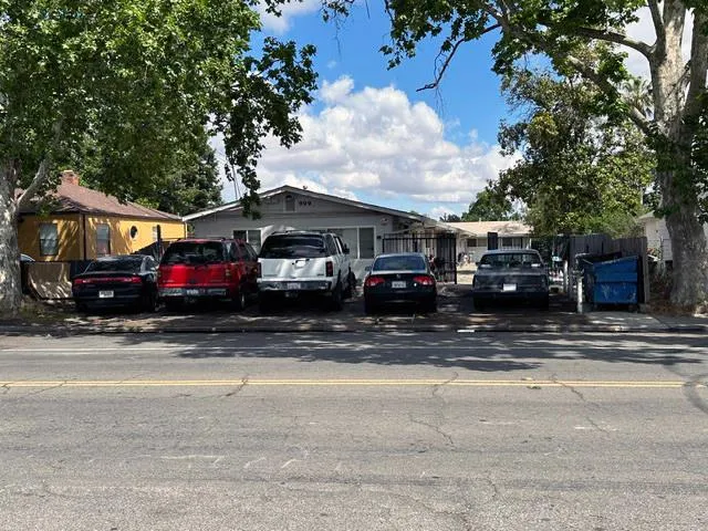 a car parked in front of a house