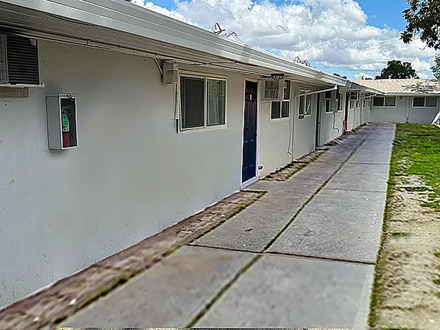 a front view of a house with windows