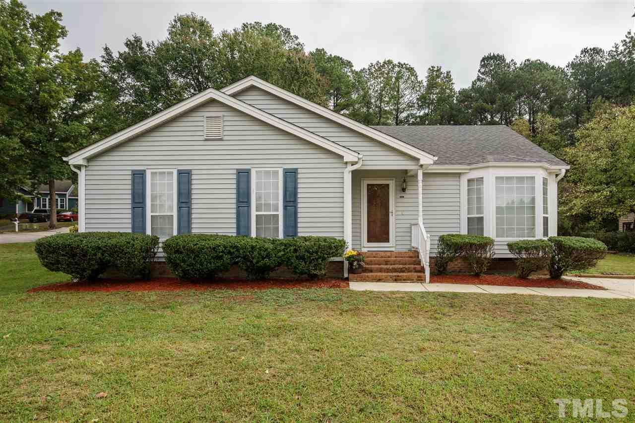 2301 Carthage Circle Raleigh, NC 27604 - Photo 1 of 17 a view of a house with backyard and garden
