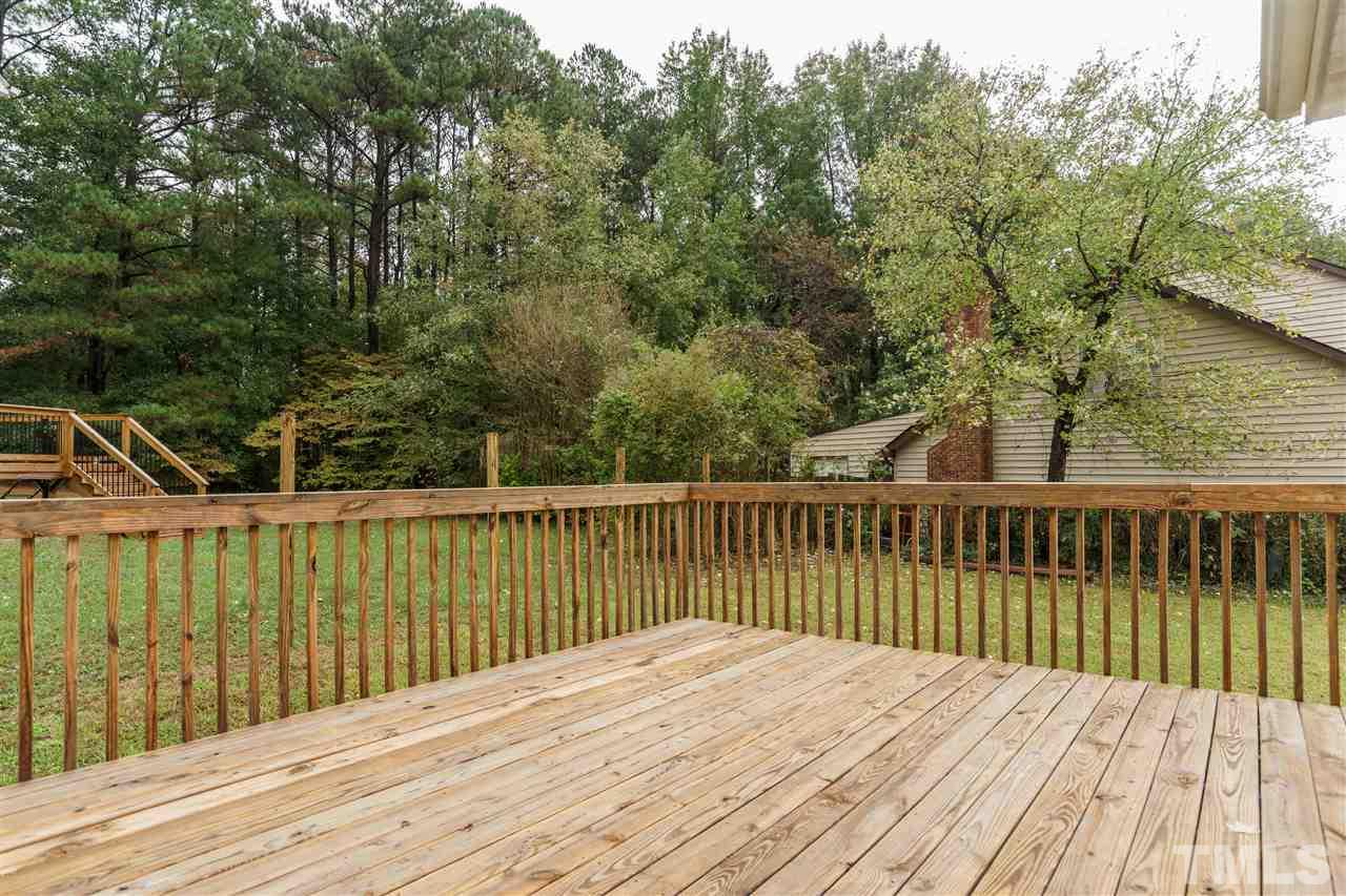 2301 Carthage Circle Raleigh, NC 27604 - Photo 14 of 17 a view of balcony with wooden floor and fence