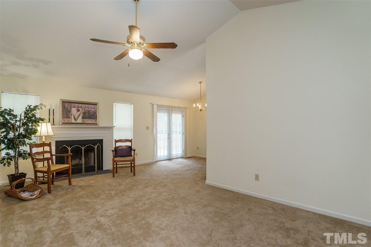 2301 Carthage Circle Raleigh, NC 27604 - Photo 3 of 17 a view of a livingroom with furniture and a ceiling fan