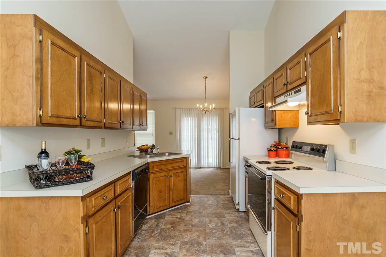 2301 Carthage Circle Raleigh, NC 27604 - Photo 7 of 17 a kitchen that has a sink and cabinets