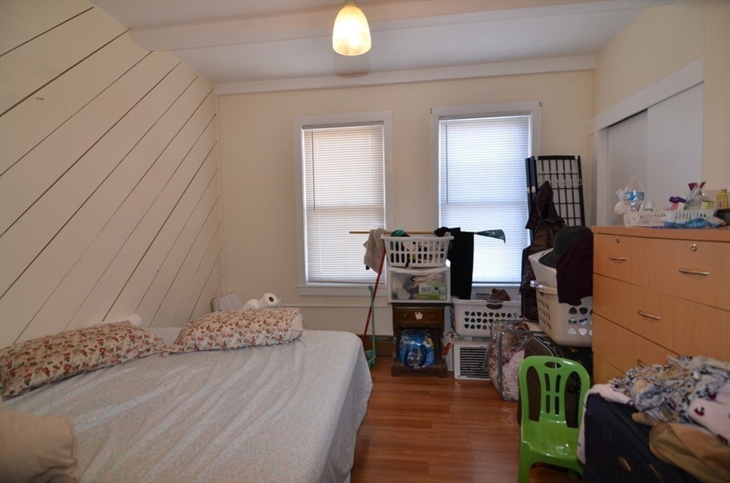 30 Copeland Street, Unit 3 Quincy, MA 02169 - Photo 12 of 17 a bedroom with furniture and natural light