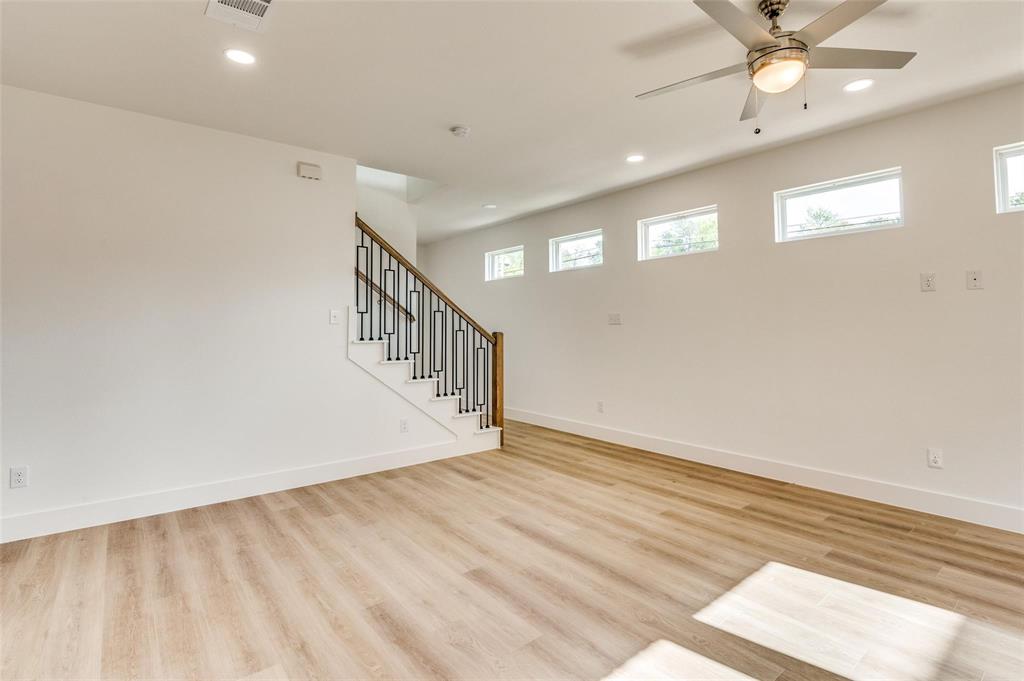 7307 Rubio Place Dallas, TX 75235 - Photo 4 of 17 a view of an entryway with wooden floor