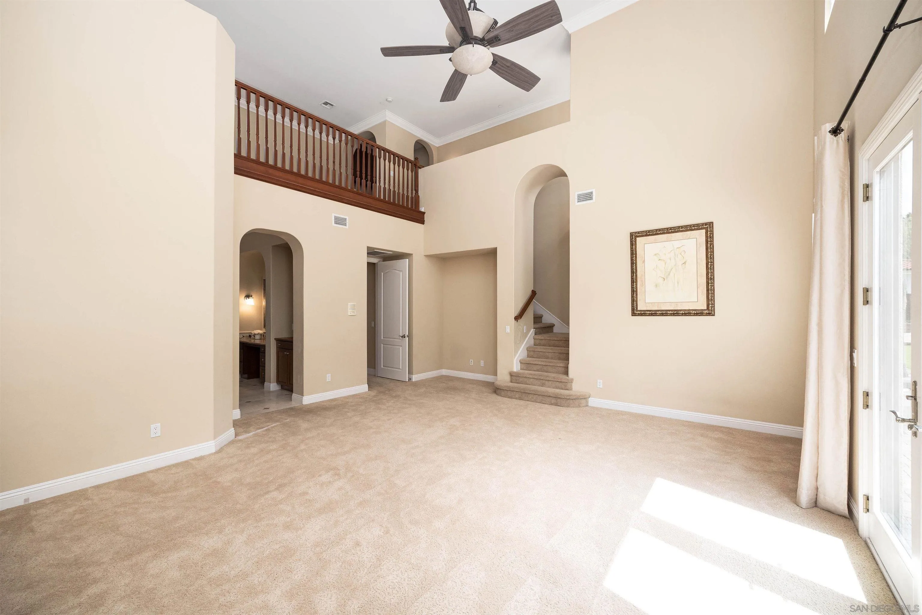14803 Whispering Ridge Road San Diego, CA 92131 - Photo 15 of 41 a view of empty room with ceiling fan