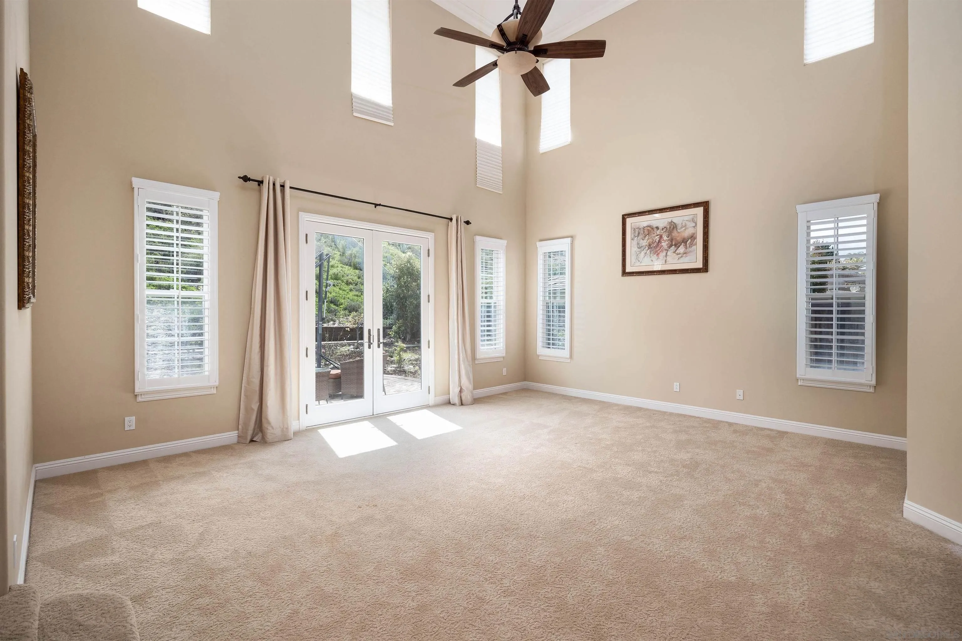 14803 Whispering Ridge Road San Diego, CA 92131 - Photo 16 of 41 a view of an empty room with a window
