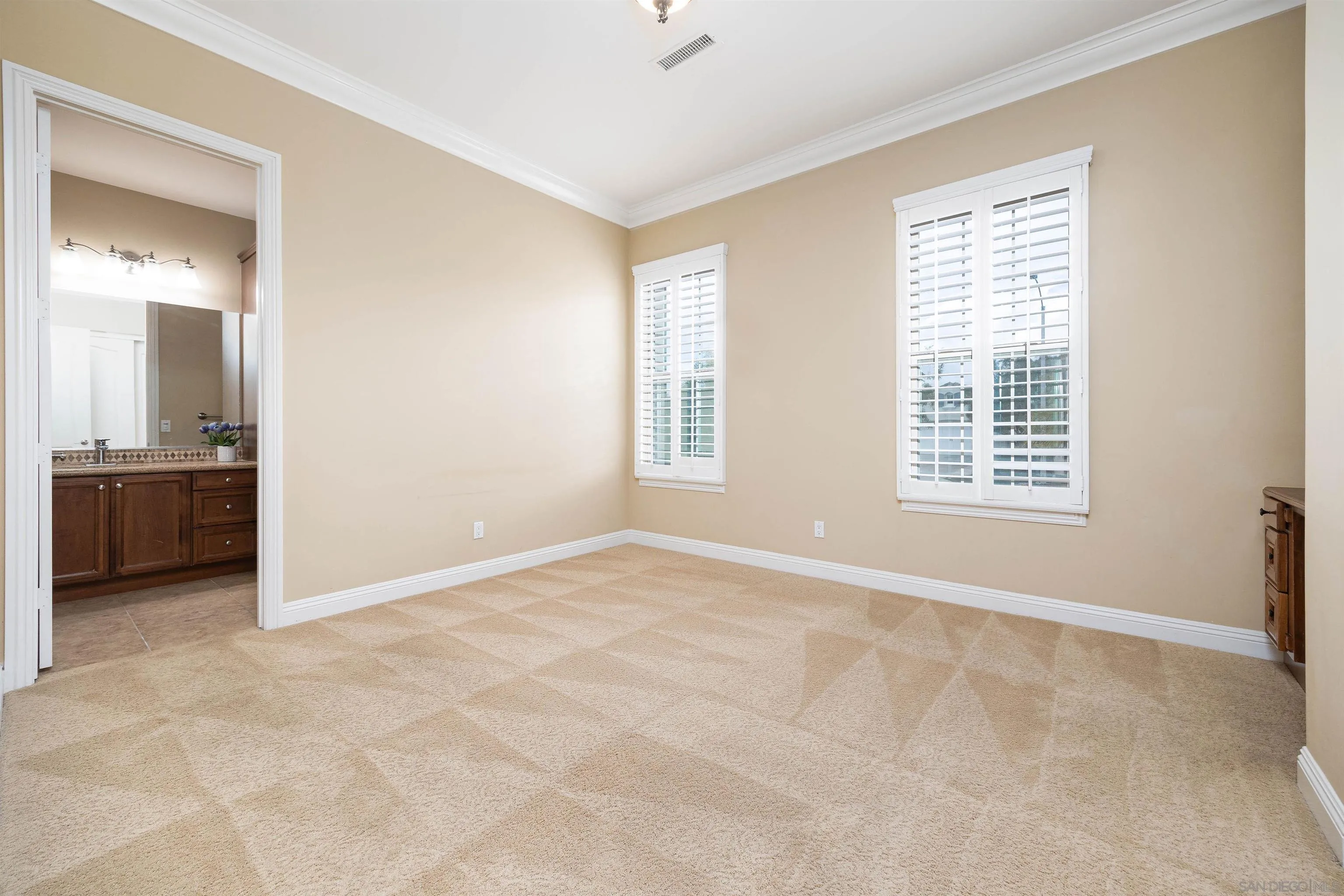 14803 Whispering Ridge Road San Diego, CA 92131 - Photo 24 of 41 a view of an empty room with a window
