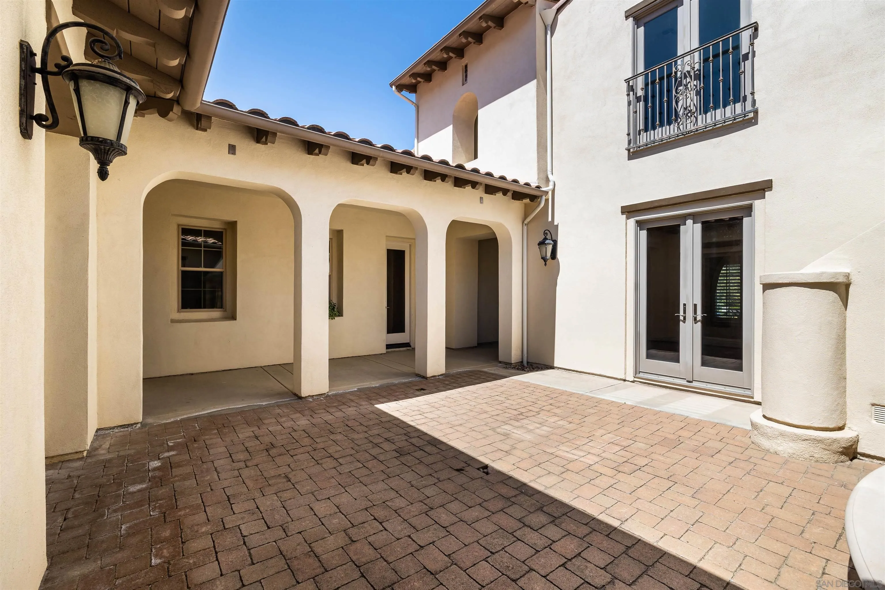 14803 Whispering Ridge Road San Diego, CA 92131 - Photo 27 of 41 a view of a white house with many windows