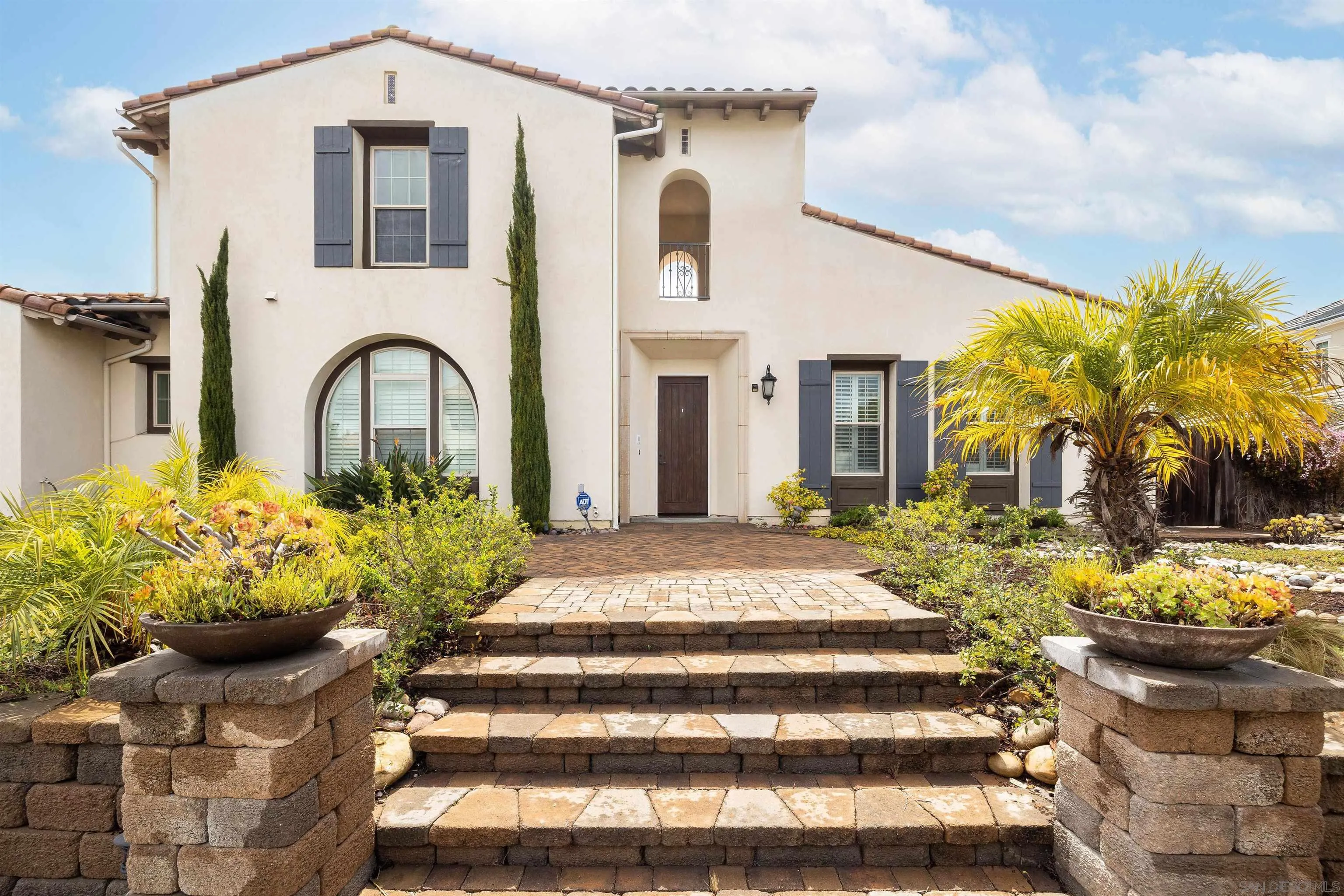 14803 Whispering Ridge Road San Diego, CA 92131 - Photo 3 of 41 a front view of a house with a porch
