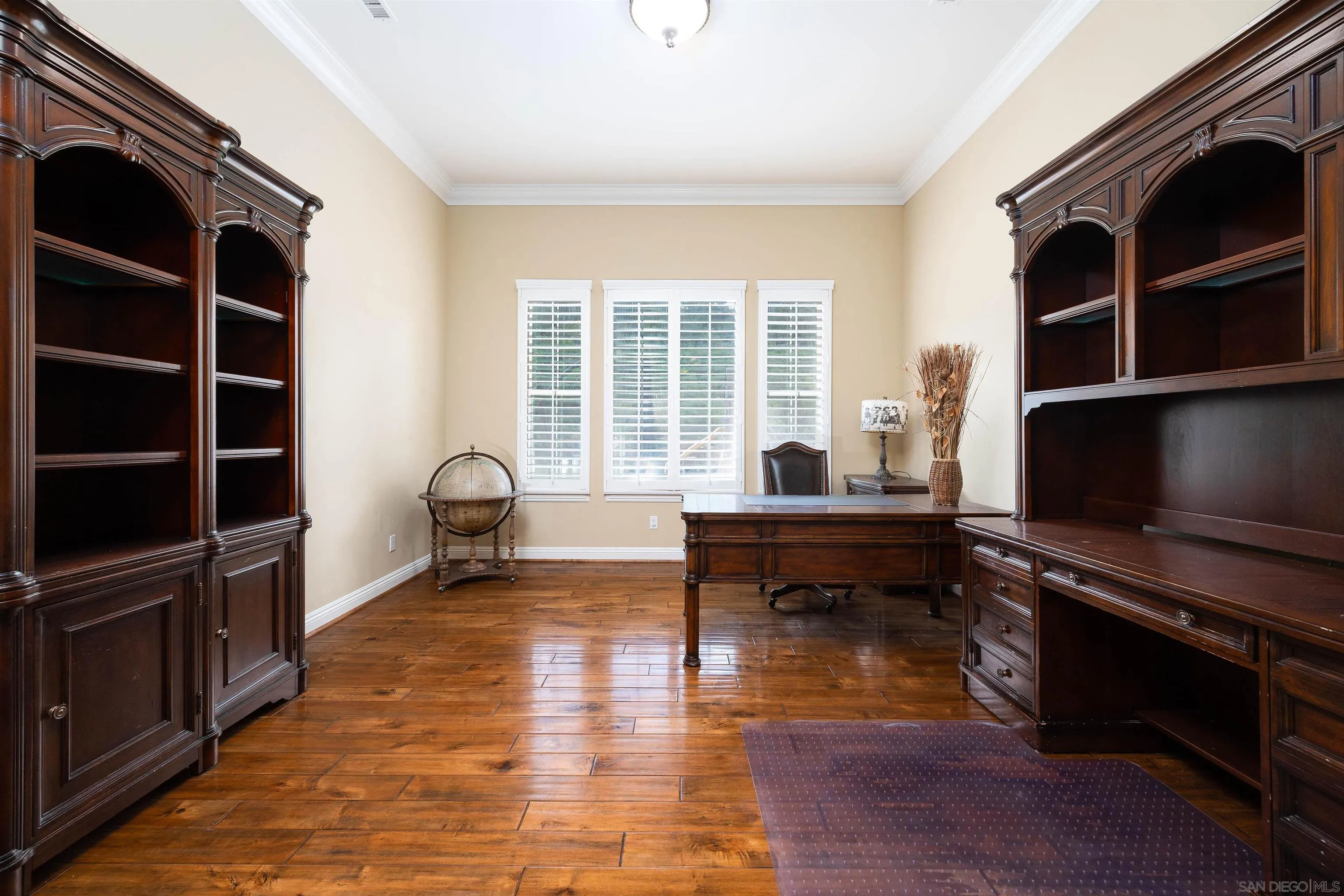 14803 Whispering Ridge Road San Diego, CA 92131 - Photo 5 of 41 a living room with furniture flat screen tv and window