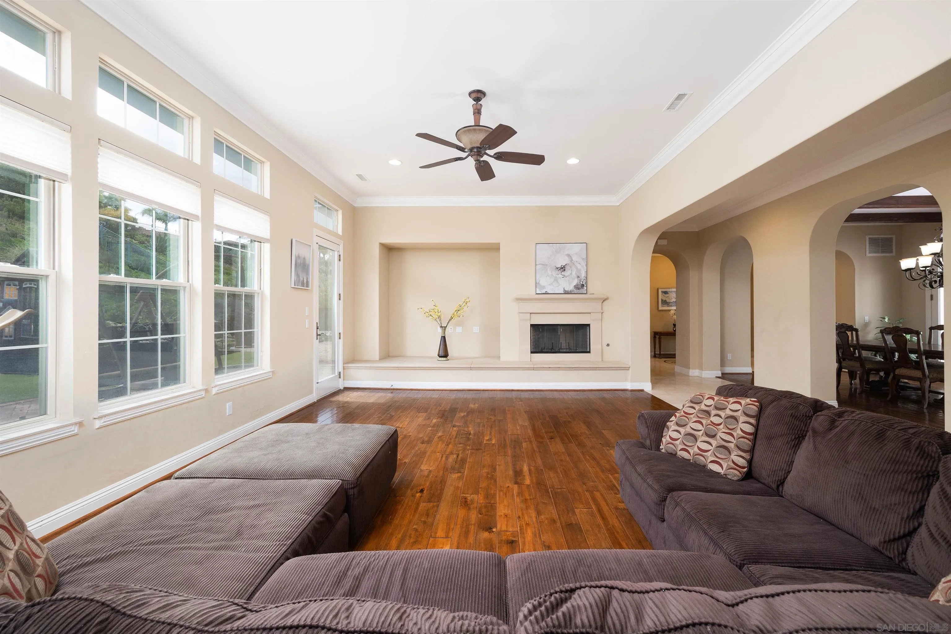 14803 Whispering Ridge Road San Diego, CA 92131 - Photo 9 of 41 a living room with furniture and a fireplace