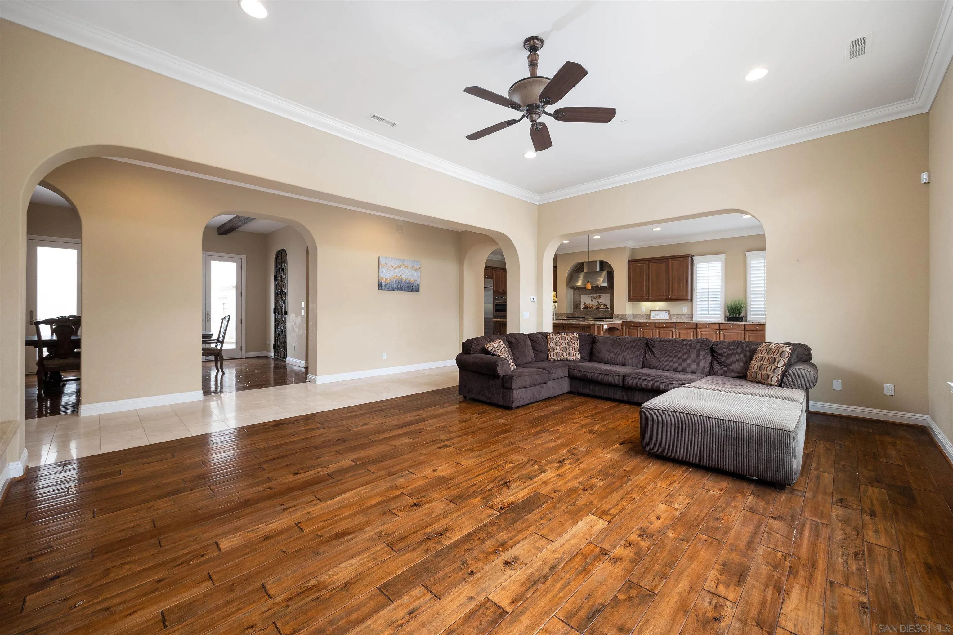 14803 Whispering Ridge Road San Diego, CA 92131 - Photo 10 of 41 a living room with furniture and a wooden floor