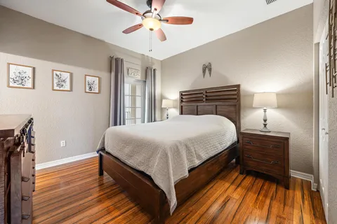 a bathroom with a sink a toilet and shower curtain