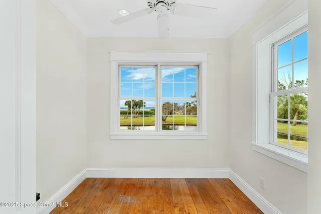 a view of an swimming pool with a yard