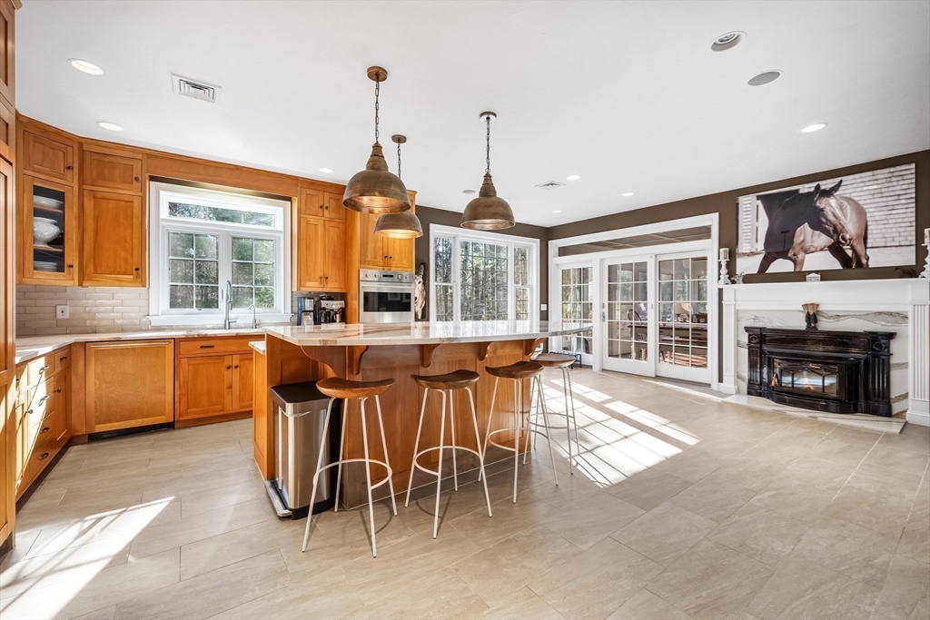 98 Valley Road Boxford, MA 01921 - Photo 11 of 40 a view of a dining room with furniture window and outside view
