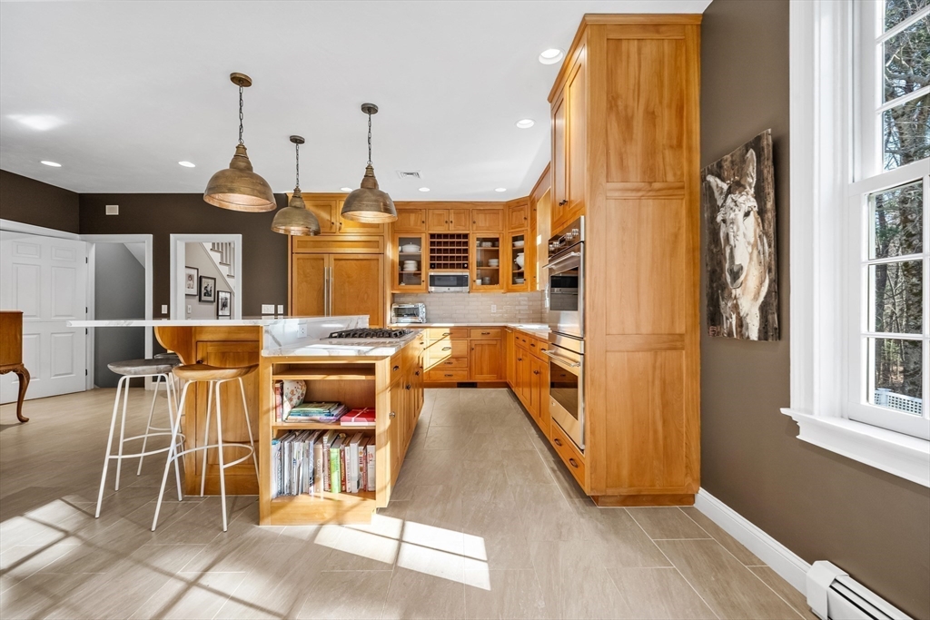 98 Valley Road Boxford, MA 01921 - Photo 12 of 40 a view of a dining room with furniture