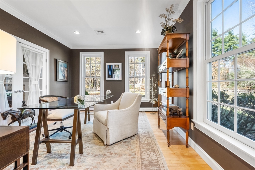 98 Valley Road Boxford, MA 01921 - Photo 15 of 40 a living room with furniture a rug and a window