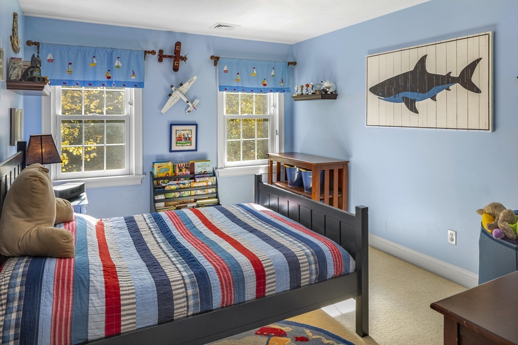 98 Valley Road Boxford, MA 01921 - Photo 24 of 40 a bedroom with a bed and a painting on the wall