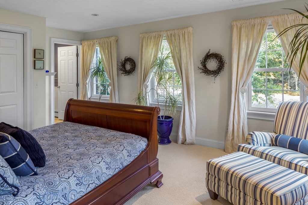 98 Valley Road Boxford, MA 01921 - Photo 25 of 40 a bedroom with a bed and window