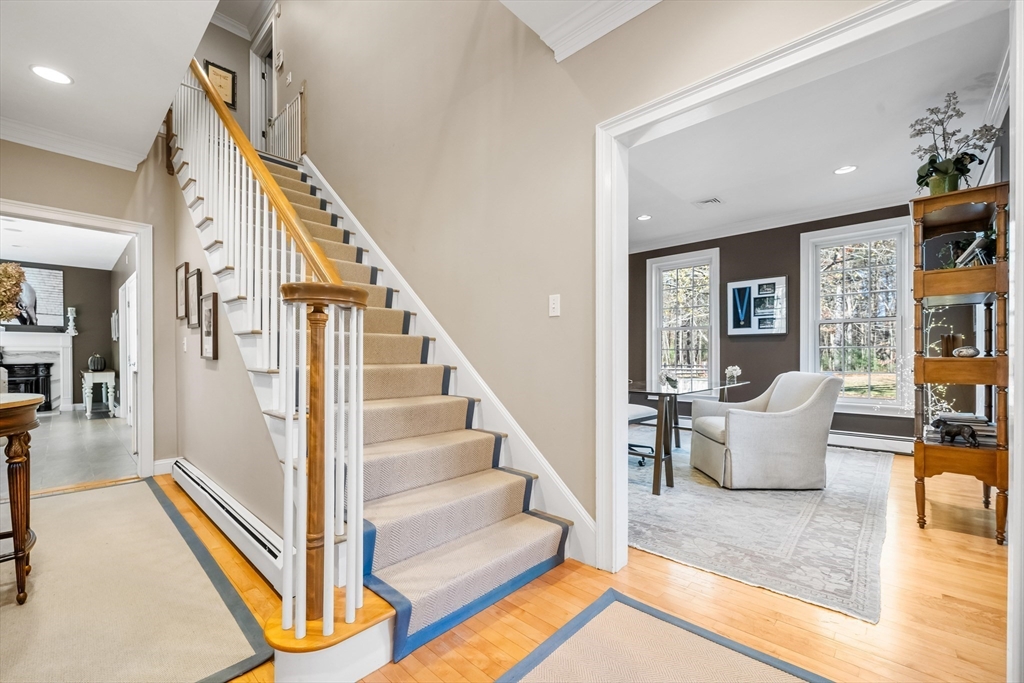 98 Valley Road Boxford, MA 01921 - Photo 7 of 40 a living room with furniture and wooden floor