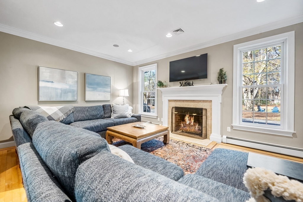 98 Valley Road Boxford, MA 01921 - Photo 9 of 40 a living room with furniture fireplace and window