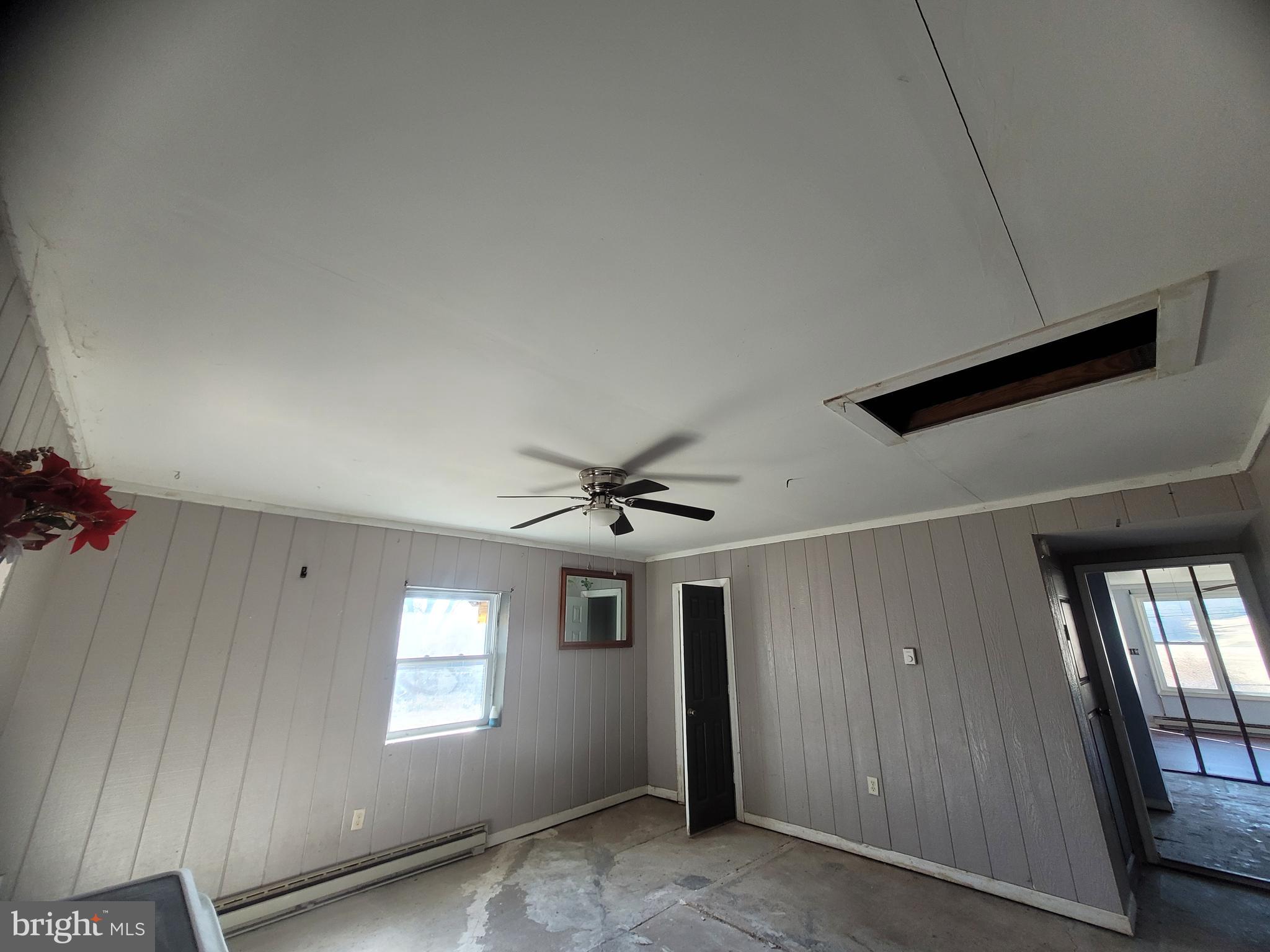 2210 Hyndman Road Hyndman, PA 15545 - Photo 5 of 24 a view of an empty room with a window