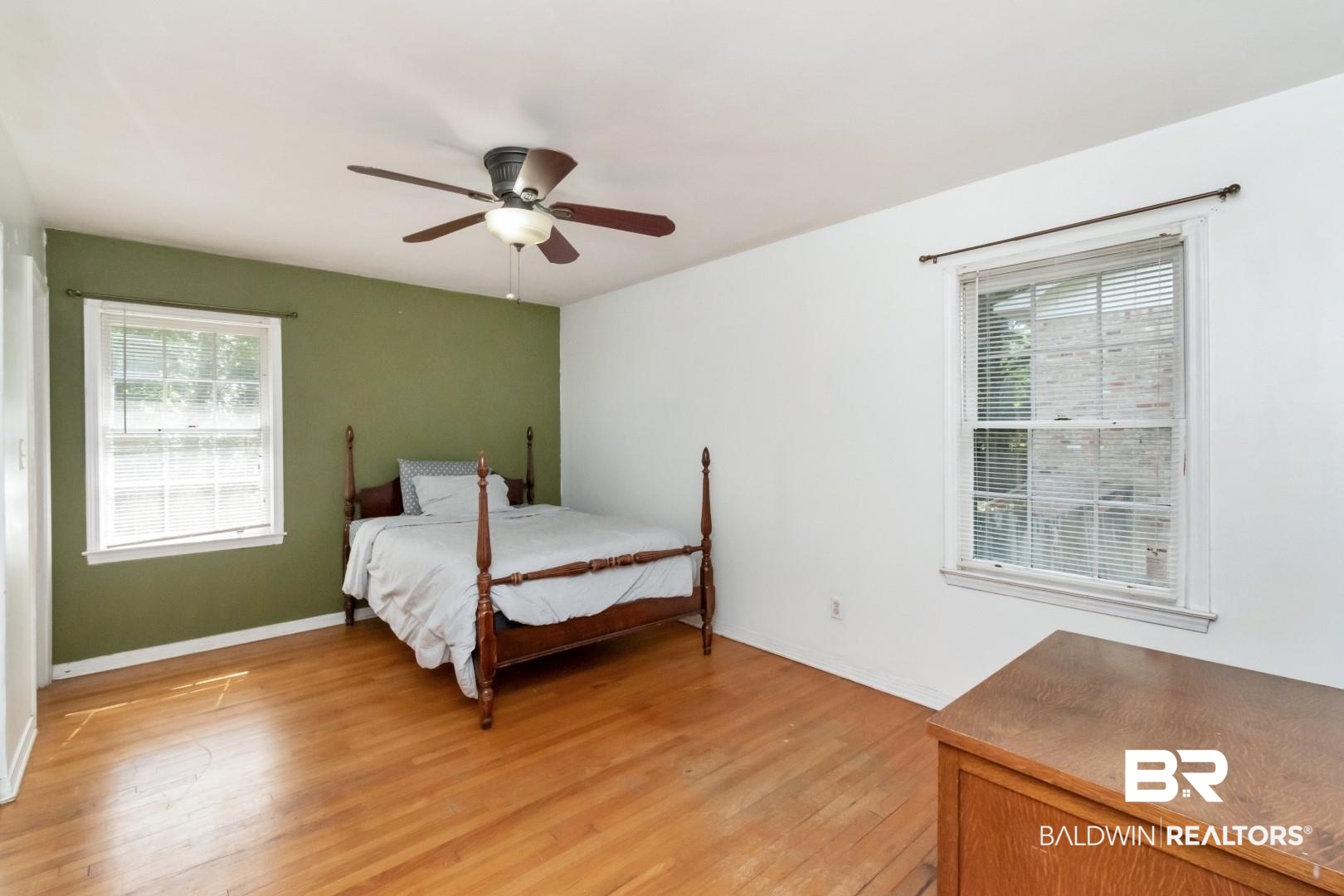 320 Vanderbilt Drive Mobile, AL 36608 - Photo 27 of 39 Bedroom with multiple windows, light wood-type flooring, and ceiling fan