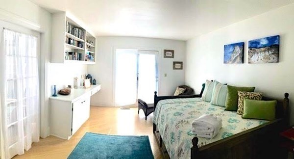 223 Sandpiper Lane Tisbury, MA 02568 - Photo 12 of 17 a bedroom with furniture and a couch