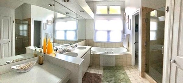 223 Sandpiper Lane Tisbury, MA 02568 - Photo 16 of 17 a bath room with a bath tub and a shower