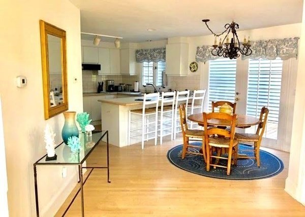 223 Sandpiper Lane Tisbury, MA 02568 - Photo 4 of 17 a view of a dining room with furniture