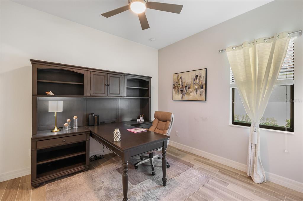 6036 Cessna Run Bradenton, FL 34211 - Photo 28 of 75 a workspace with furniture and window