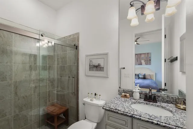 a view of a room with wooden floor and outdoor seating