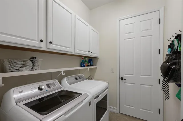 a view of a swimming pool with a yard