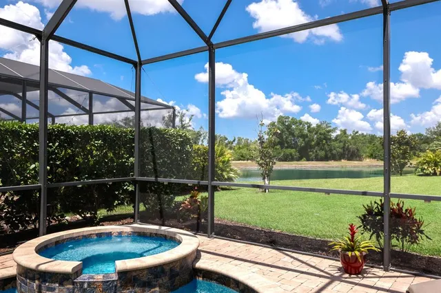 a view of an outdoor space and tennis court