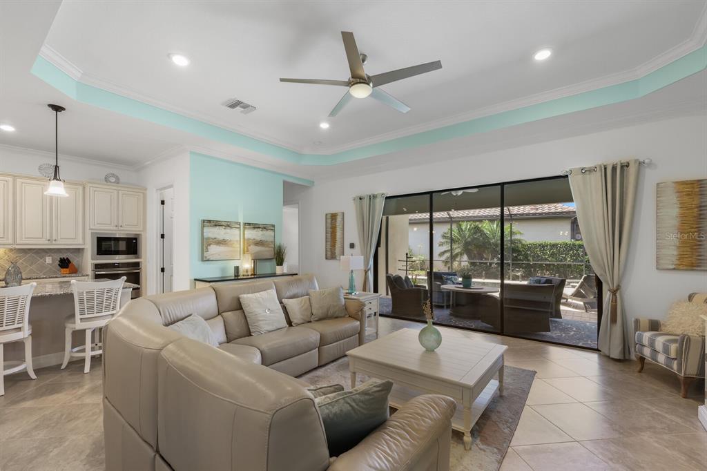 6036 Cessna Run Bradenton, FL 34211 - Photo 10 of 75 a living room with furniture and a large window