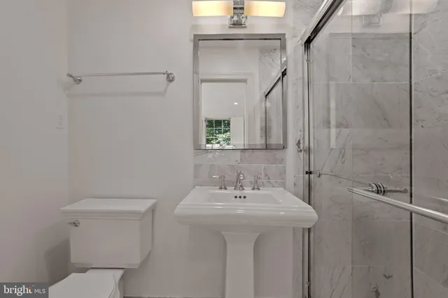 a view of staircase with black and white walls