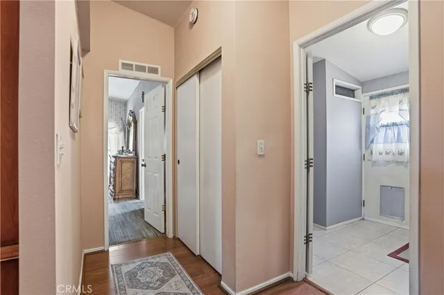 a view of a bathroom from a hallway