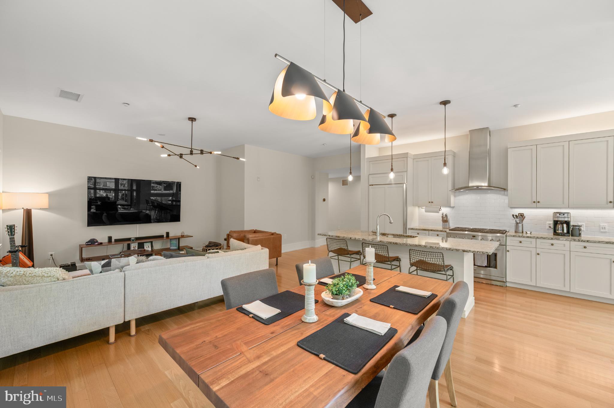 112 Iron Works Way Wayne, PA 19087 - Photo 18 of 50 a large kitchen with a table and chairs
