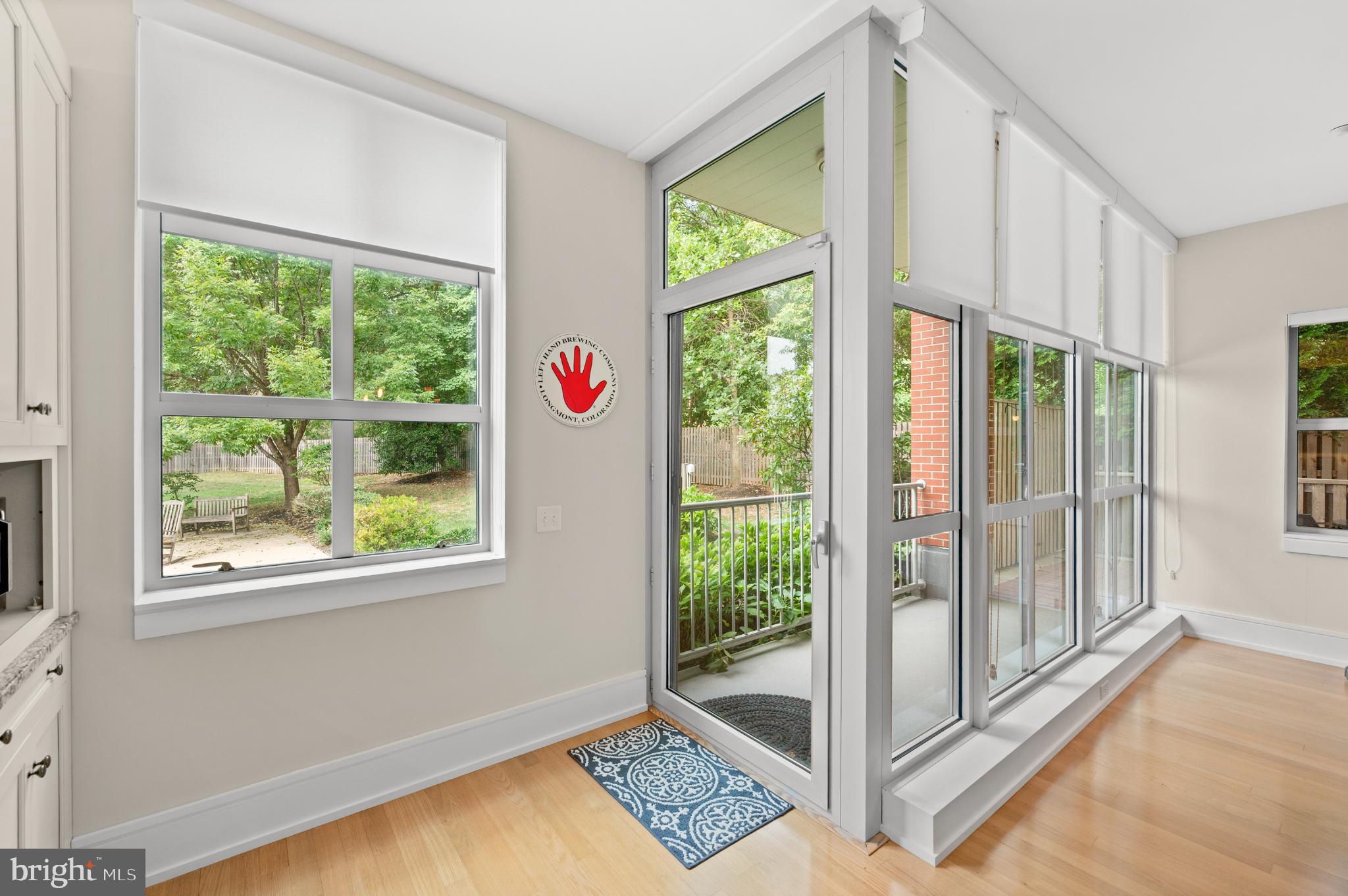 112 Iron Works Way Wayne, PA 19087 - Photo 24 of 50 a view of an entryway with a floor to ceiling window and a living room