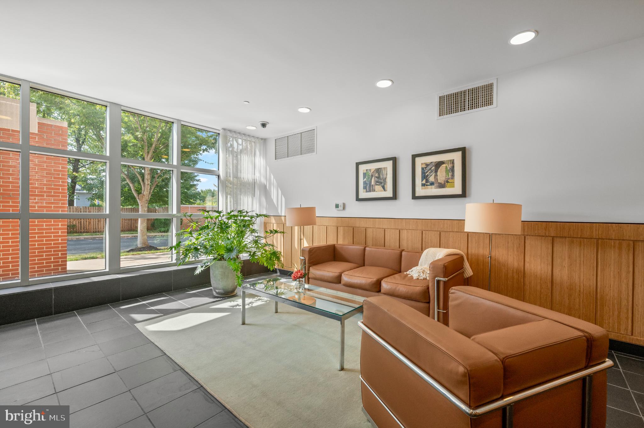 112 Iron Works Way Wayne, PA 19087 - Photo 3 of 50 a living room with furniture and a large window