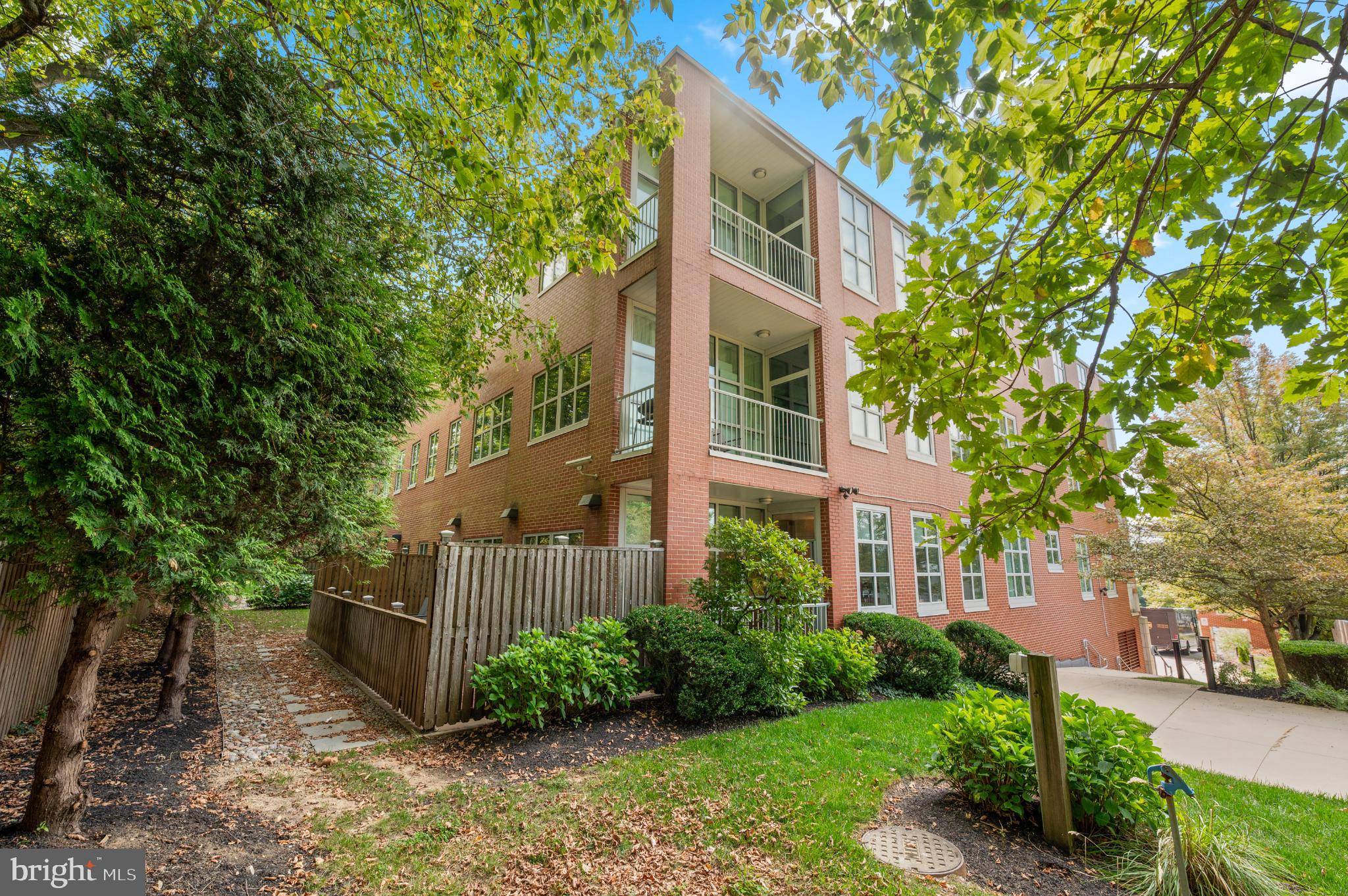 112 Iron Works Way Wayne, PA 19087 - Photo 33 of 50 a front view of a house with garden