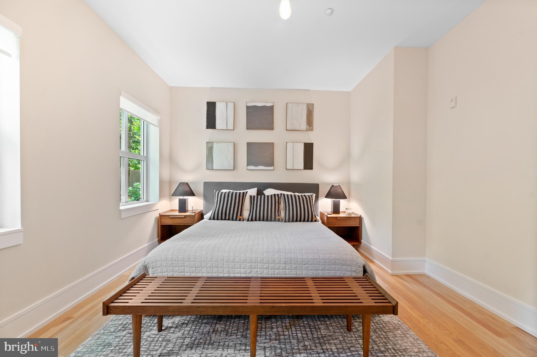 112 Iron Works Way Wayne, PA 19087 - Photo 36 of 50 a bedroom with a bed and wooden floor