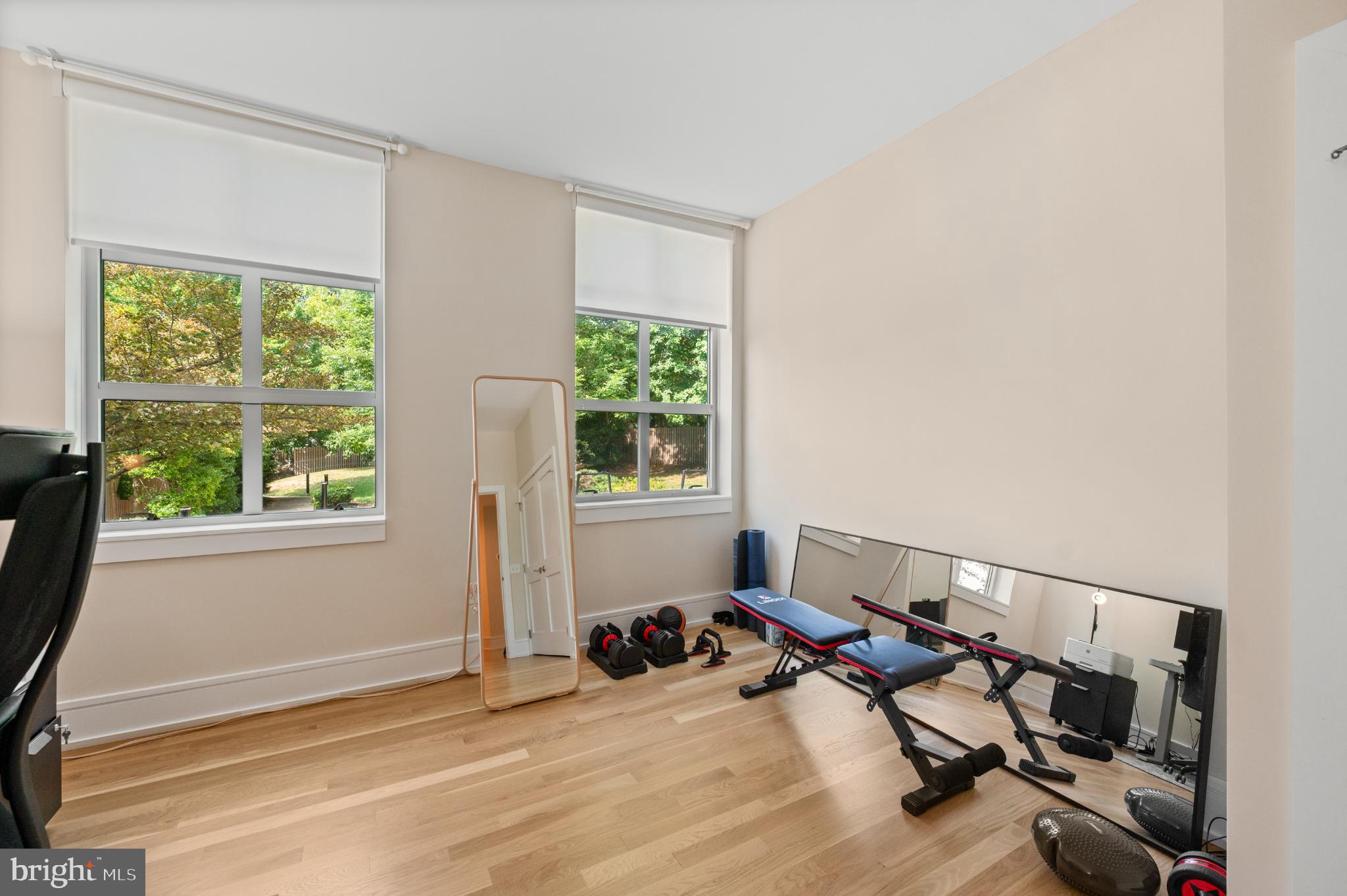 112 Iron Works Way Wayne, PA 19087 - Photo 44 of 50 a view of a room with gym equipment and a window