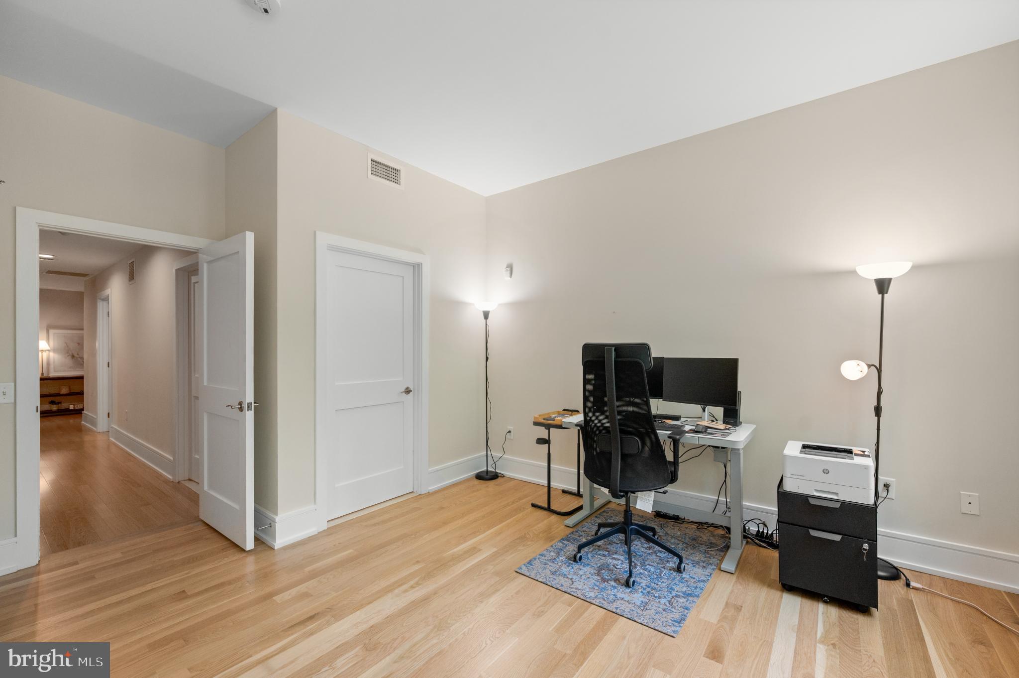112 Iron Works Way Wayne, PA 19087 - Photo 45 of 50 a view of a workspace with furniture and a flat screen tv