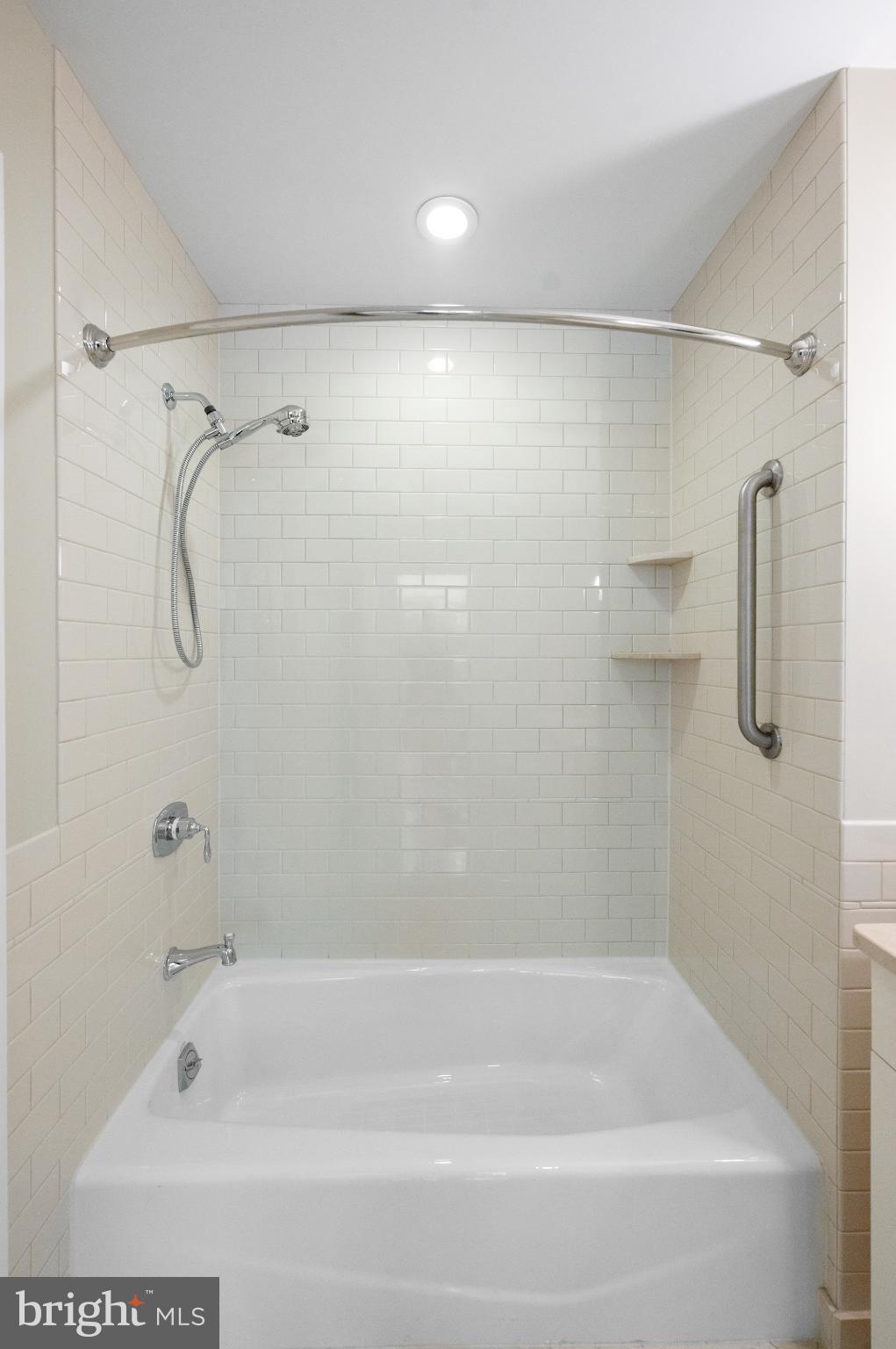 112 Iron Works Way Wayne, PA 19087 - Photo 47 of 50 a bathroom with a shower and a bath tub