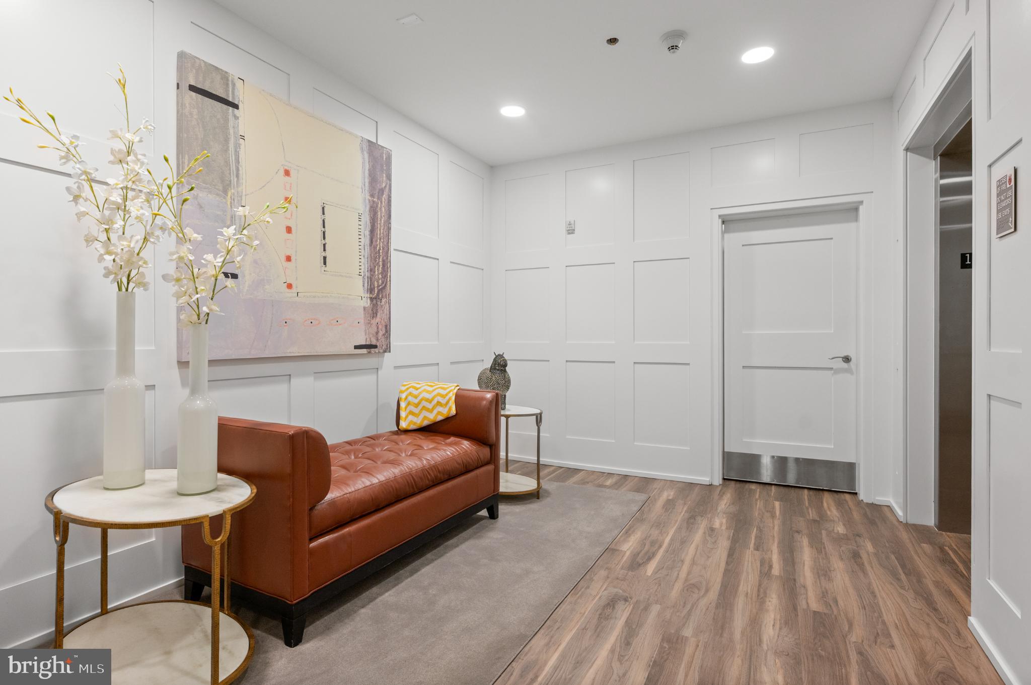 112 Iron Works Way Wayne, PA 19087 - Photo 5 of 50 a living room with furniture and a wooden floor