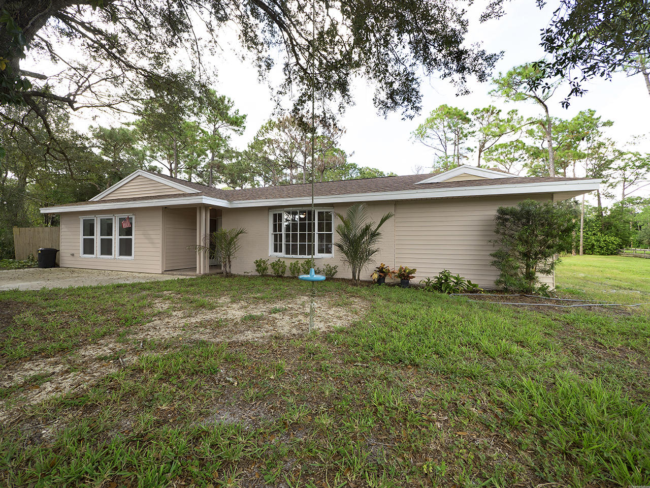 11717 165th Road North Jupiter, FL 33478 - Photo 1 of 13 Front House