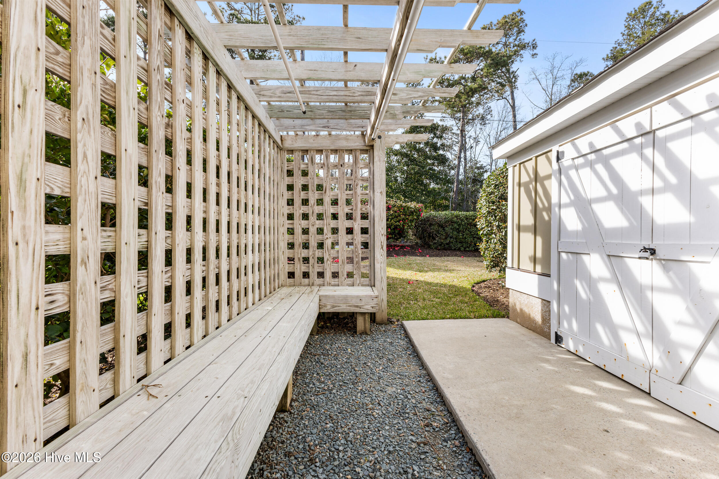 191 H L Smith Road Wilmington, NC 28411 - Photo 48 of 72 Outside storage and pergola