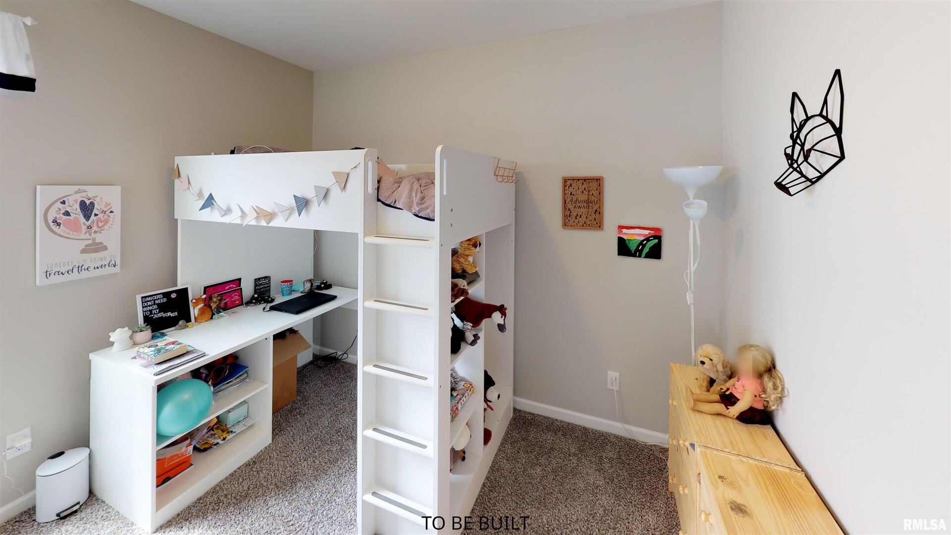 6 South 5th Street Eldridge, IA 52748 - Photo 12 of 17 a room with furniture and gym equipment