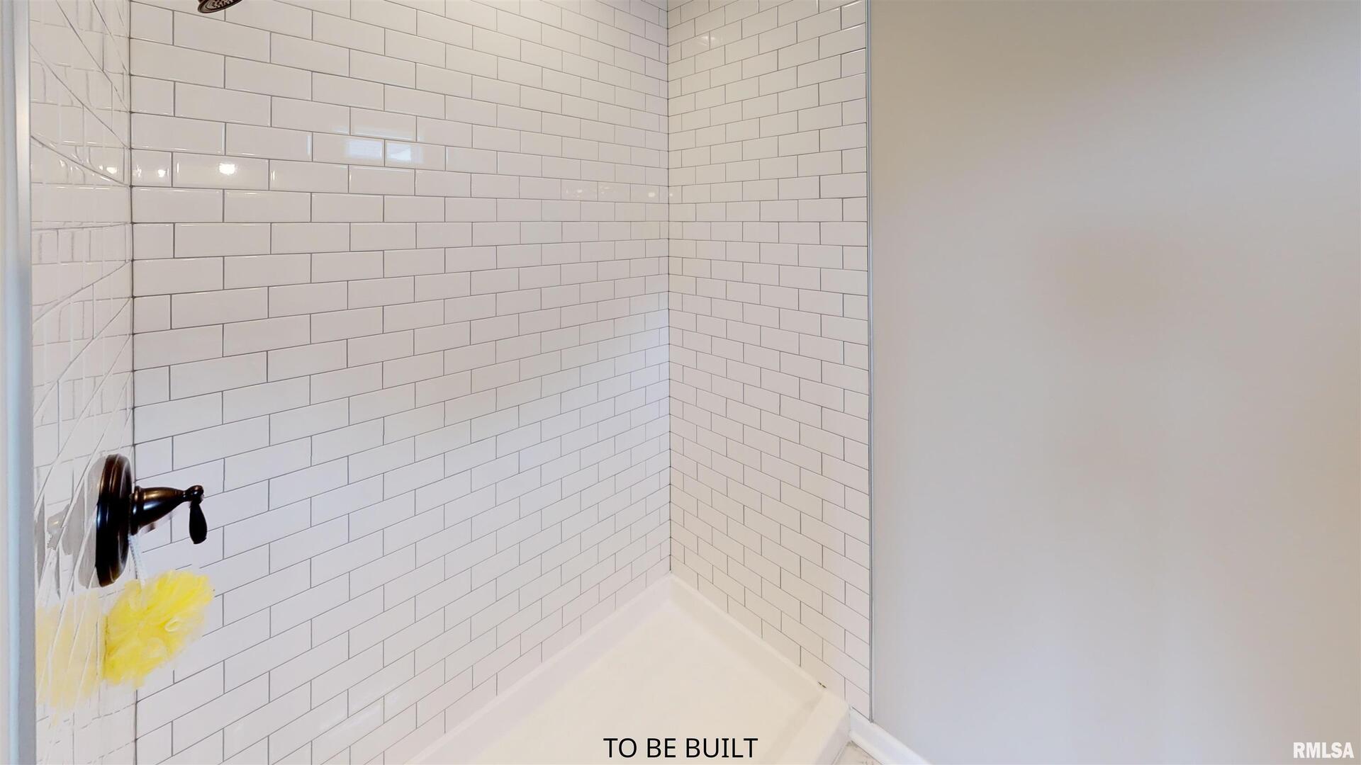 6 South 5th Street Eldridge, IA 52748 - Photo 17 of 17 a bathroom with a shower